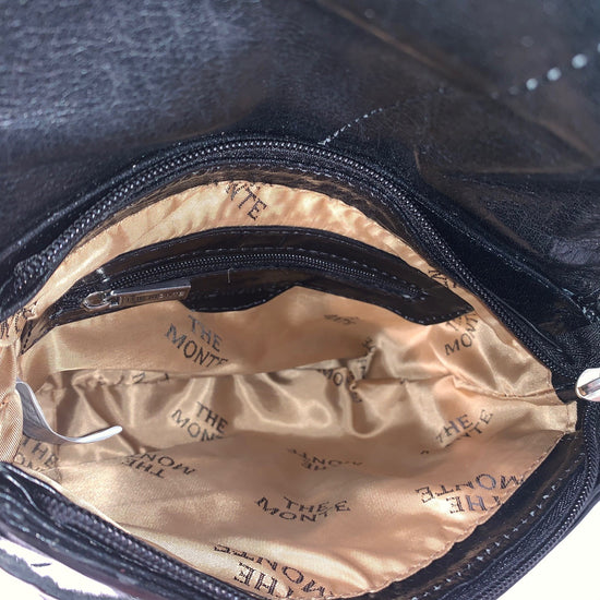 The Monte Axelremsväska Liten i Skinn Camel